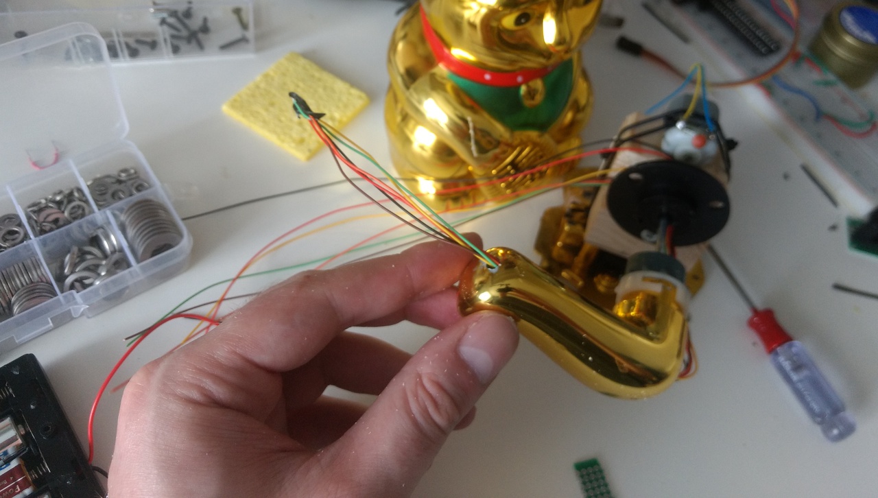 The LED driver wires poking out the knuckle.