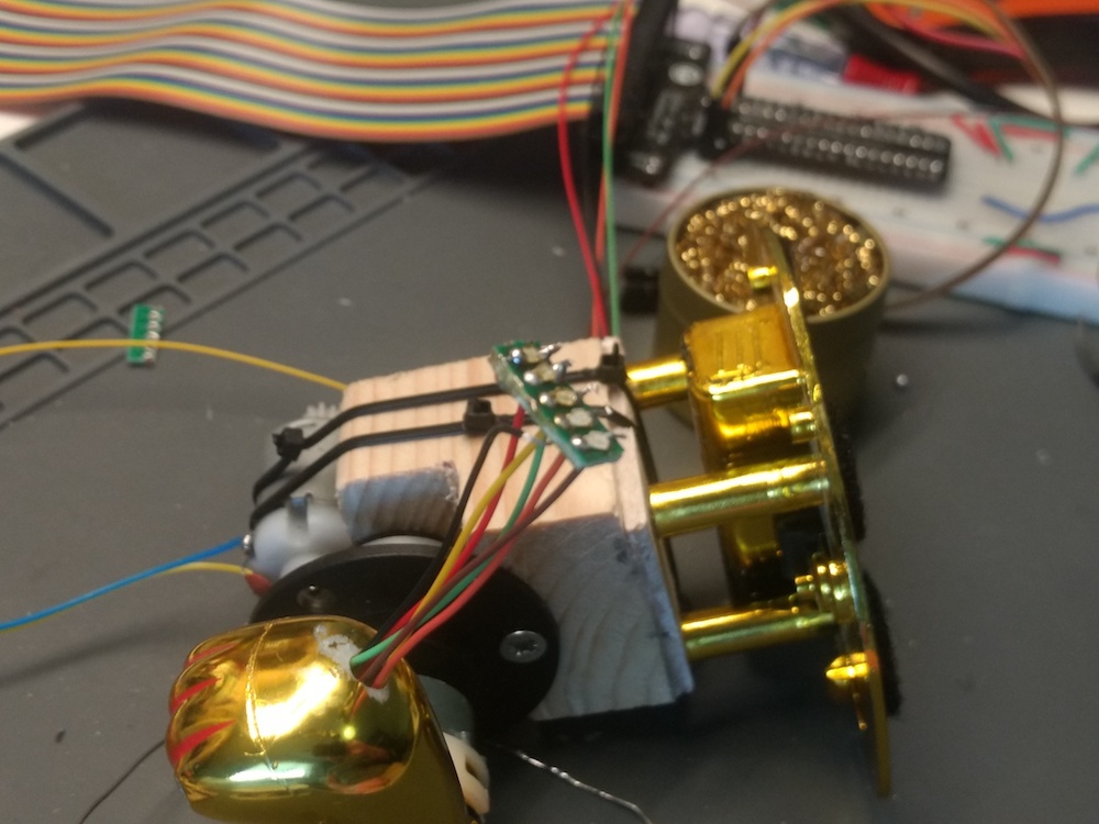 SMD LEDs in place on the lighting board.